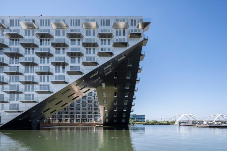 BIG and Barcode Architects have completed the Sluishuis housing block