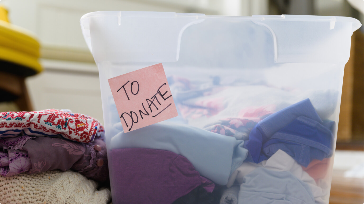 Clothes in bin marked for donation