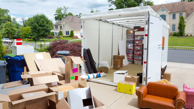 Portable storage unit being loaded