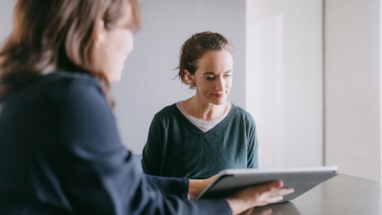 Woman meeting female banker for financial advice