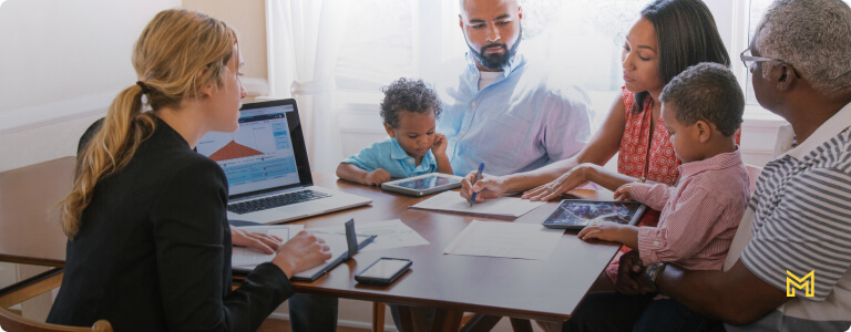 Financial advisor talking to clients